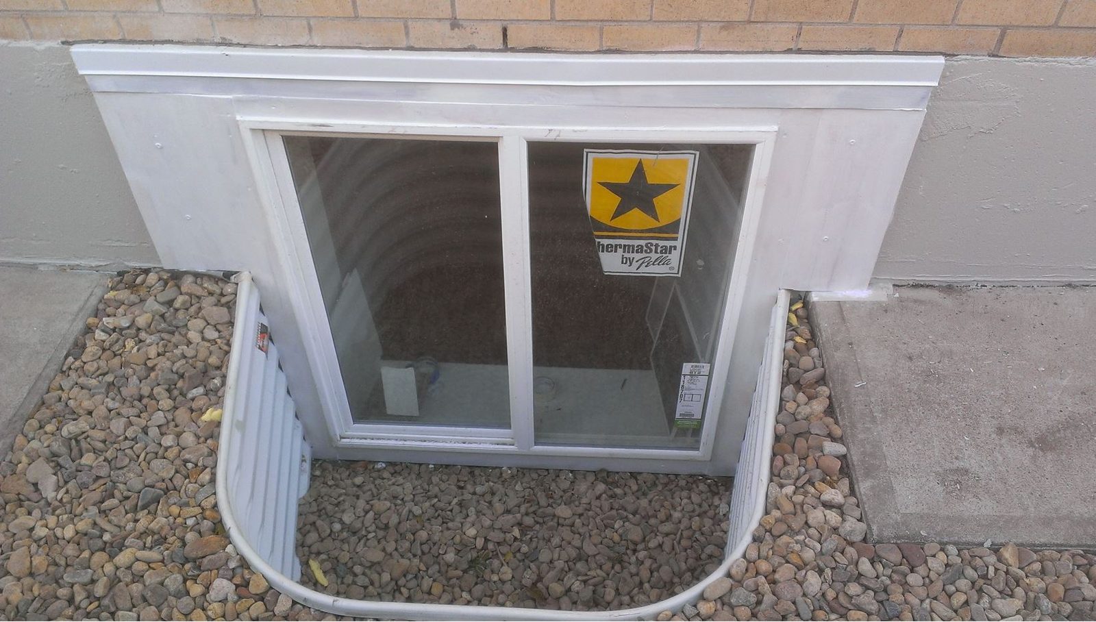 Basement egress window installation