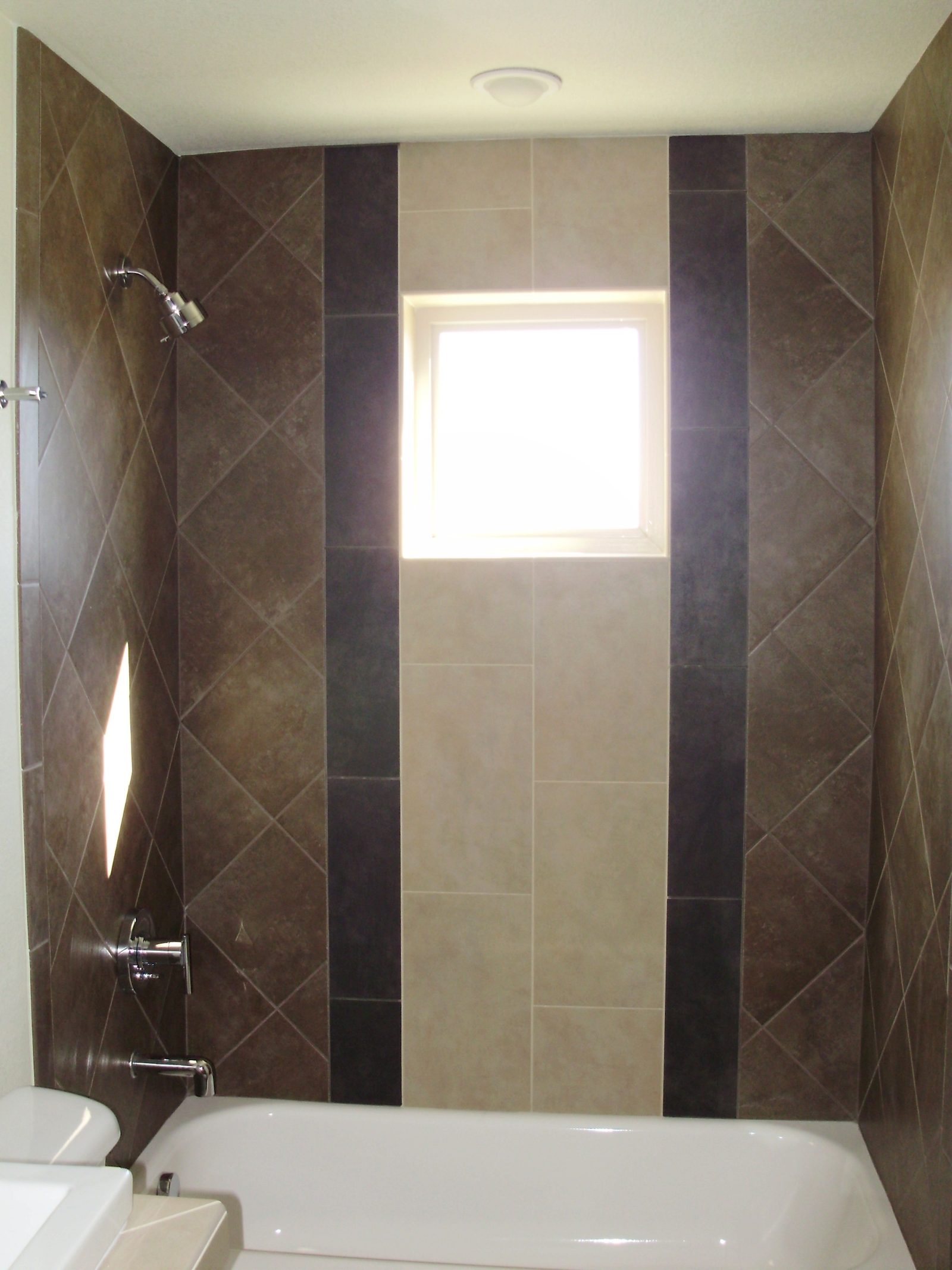 Custom tiled tub and shower surround